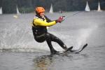 The photo shows a skier on a water ski lift on Lake Necko, photo by J. Koniecko