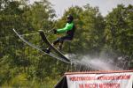 The photo shows a skier during a water ski jump during the Netta Cup competition, photo by J. Koniecko