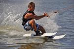 The photo shows a skier on a water ski lift on Lake Necko, photo by J. Koniecko