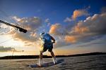 The photo shows a skier on a water ski lift on Lake Necko, photo by J. Koniecko