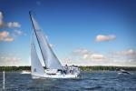 The photo shows a sailing yacht on Lake Necko, photo by J. Koniecko